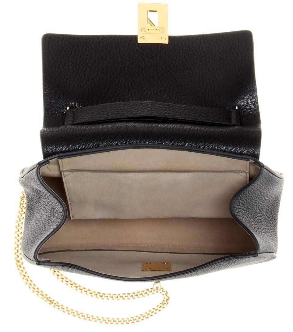 The Drew bag from Chloé is one of the house's most coveted signature pieces, and it's a sure-fire way to ignite style envy. The curved silhouette is complemented by a luxurious brushed suede interior and jewellery-inspired hardware. Let the timeless