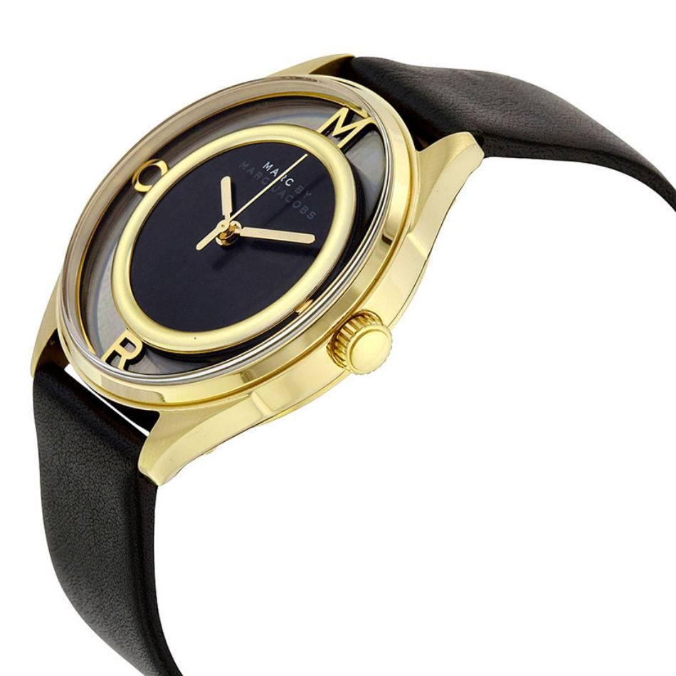 The black leather strap and chic skeleton dial make for a unique timepiece you'll treasure for years to come. From the Marc by Marc Jacobs Tether collection.

Black leather strap
Round gold-tone stainless steel case, 36mm
Black skeleton dial with