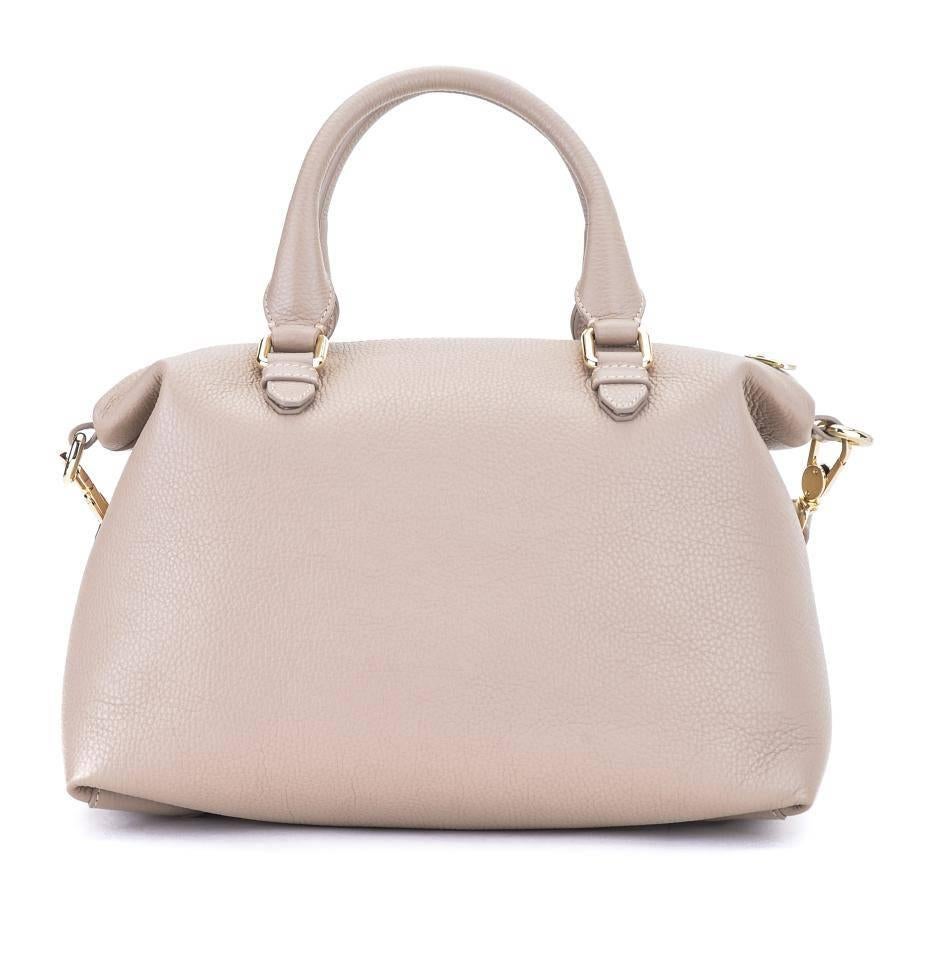 Versace Collection Pebble Leather Duffle Shoulder Bag, Beige

Walk around in style with this fashionable and gorgeous duffle from Versace. The pebbled leather creates a unique texture that exudes class and sophistication without compromising