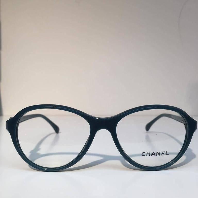 Chanel Eyeglasses, Teal Green (CH3226)

Brand new, never used and in excellent condition

Chanel glasses are always on the cutting edge of fashion and style. Known for their distinctive and innovative designs and with all frames made exclusively