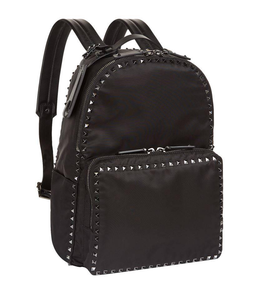 Valentino Studded Backpack, Black

Material: Nylon
Colour: Black
Top carry handle; Adjustable shoulder straps
Chunky zip fastening
Rockstud embellishments
Leather luggage tag
External pouch pocket; Internal slip pocket
H40cm x W27cm x D13cm