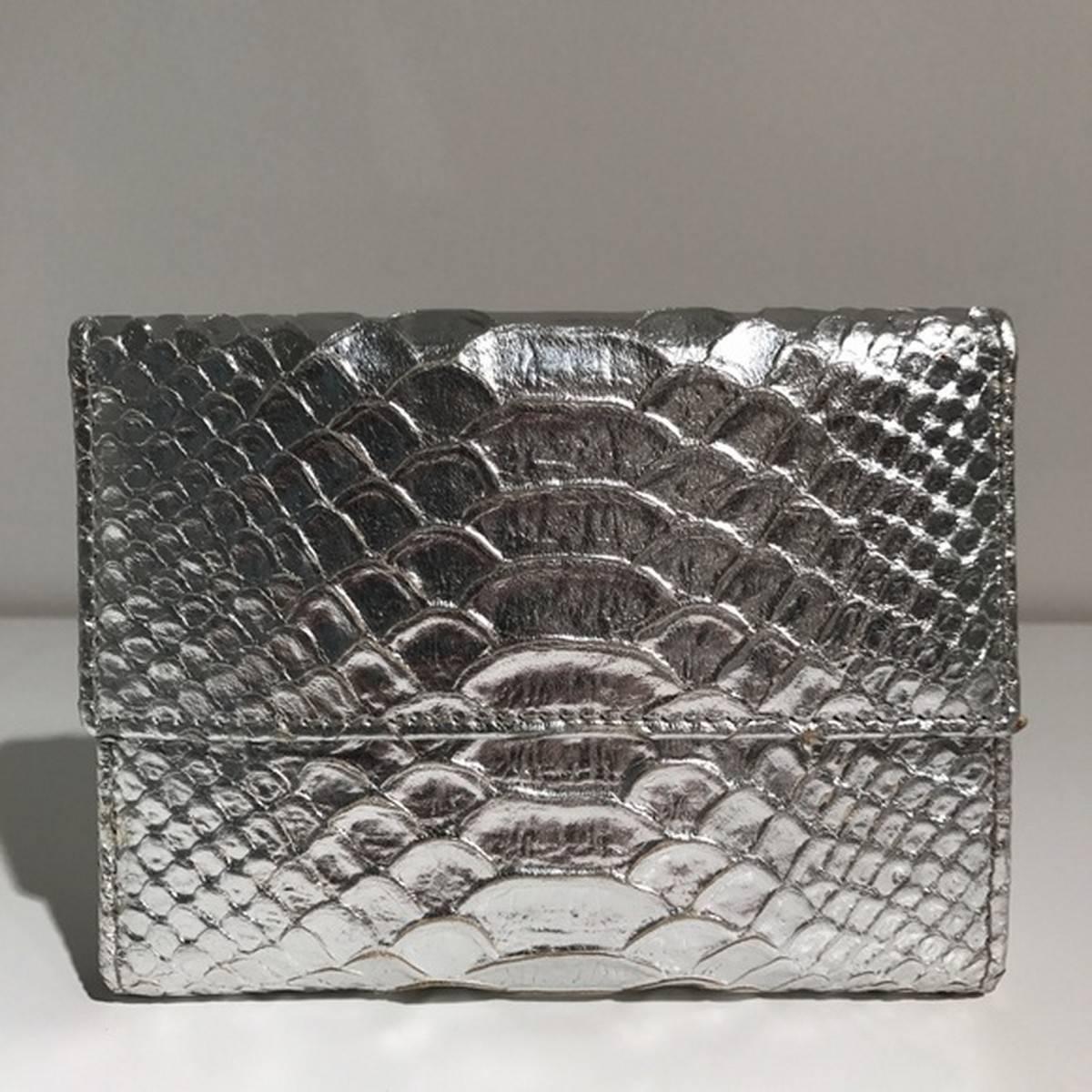 Roberto Cavalli Snakeskin Silver Wallet

Brand new.
Snakeskin Leather inside and out.
Made in Italy.
