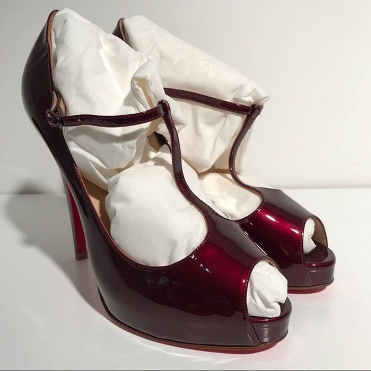 Christian Louboutin Patent Leather Peep Toe Heels (Size - 8) - 

Brand new with box. True to size. 38 European, 8 USA. Made in Italy.