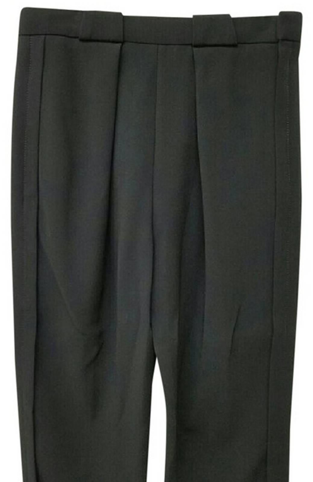 Balenciaga Paris Trousers Pants

Flap over back pockets. Side seam zipper. Zip bottom. Brand new. Never used. Tags still attached. MADE IN ITALY

Type:Pants
Size:8 (M, 29, 30)
Color:black
Brand:Balenciaga
Style/Collection:Balenciaga Paris Trousers