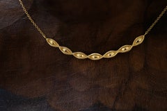 Collar con colgante «Lovers Eye» en oro amarillo de 18 quilates, de Alice Son