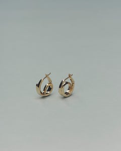 /411 Orecchini in oro giallo 18k di lott studio