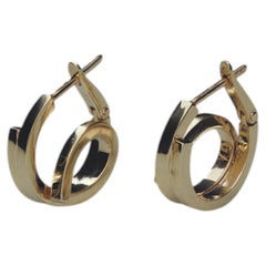 /411 Orecchini in oro giallo 18k di lott studio