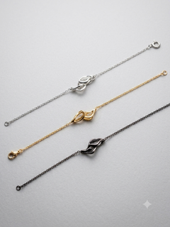 Lot de 3 bracelets « Air » en argent, or jaune et rhodium foncé par Binadi Studio