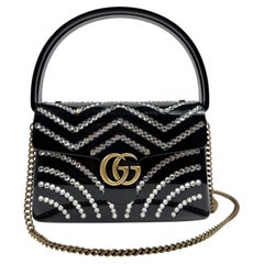 Gucci Marmont clutch resin and rhinestones
