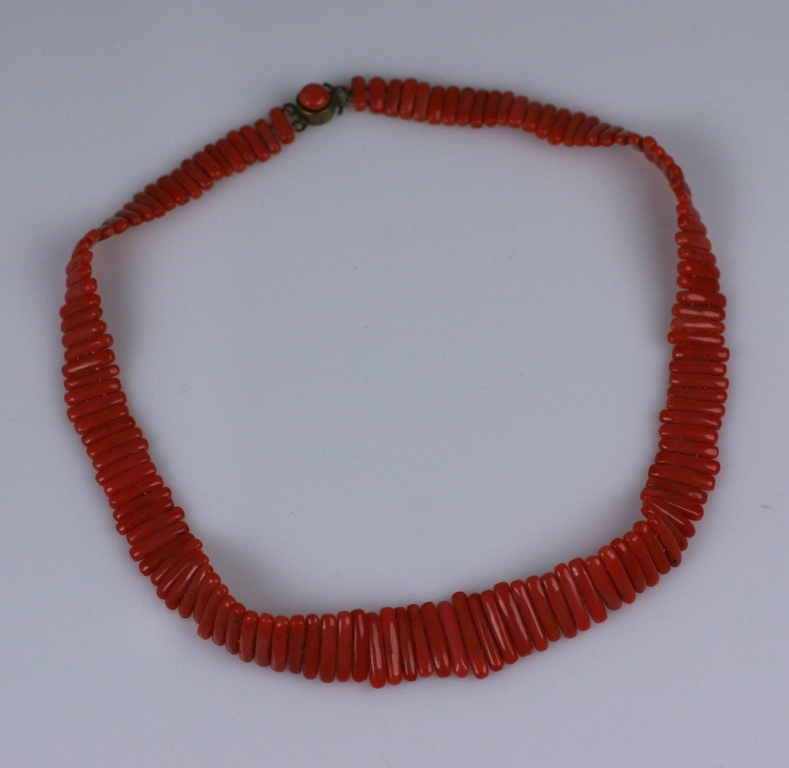 Natural Coral necklace made of graduated bars of coral toggles with coral button clasp set in gilt silver. Lovely matched color. 1900's Italy. 14.5