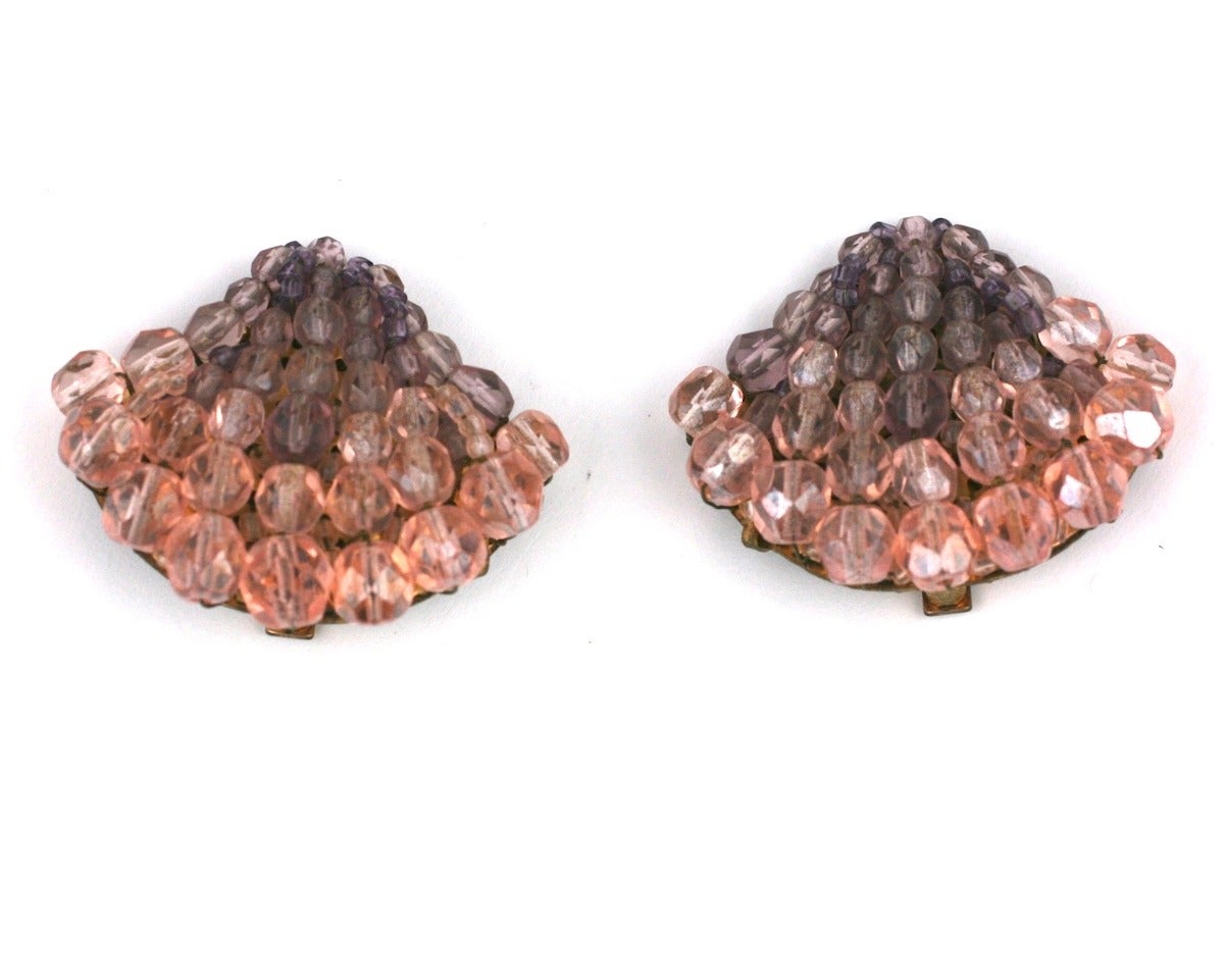 Coppola e Toppo ombre crystal earclips of pale amythest to rose in the shape of a Botticellian inspired shell. Length 1.25