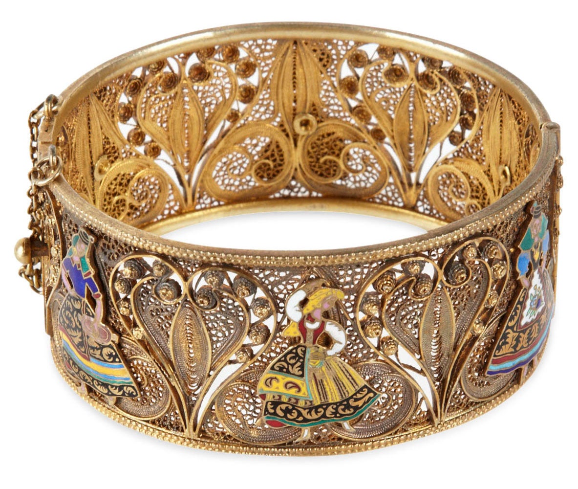 Large Antique Topazio Silver Gilt Filigree Cuff from Portugal circa 1930. Heavy silver filigree is gold washed and overlaid with enamel figures in traditional folkloric costume. Beautifully crafted. Excellent condition.