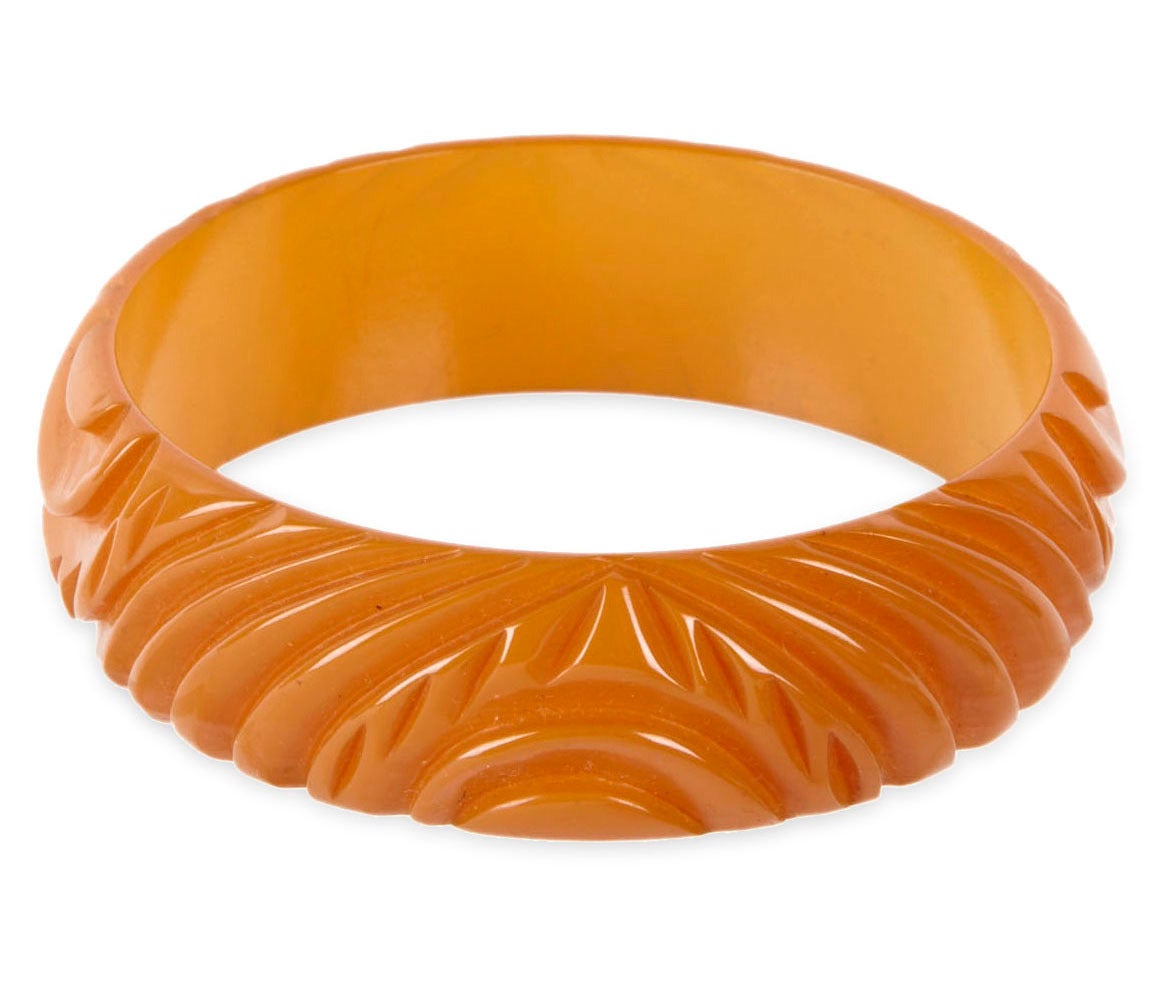 Mango Bakelite hand carved bangle form the Art Deco period with concentric circle patterns throughout.  7/8