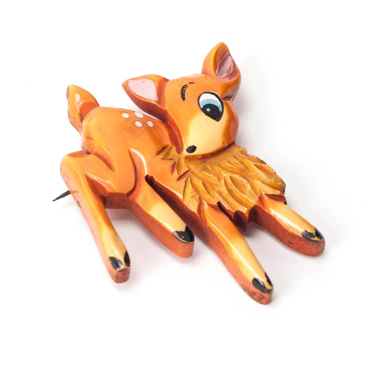 Bakelite Bambi brooch from the 1930's with cold painted enamel accents. Cartoony and Disney-esque...Classic American Folk Art. 1930's USA.
Excellent condition.