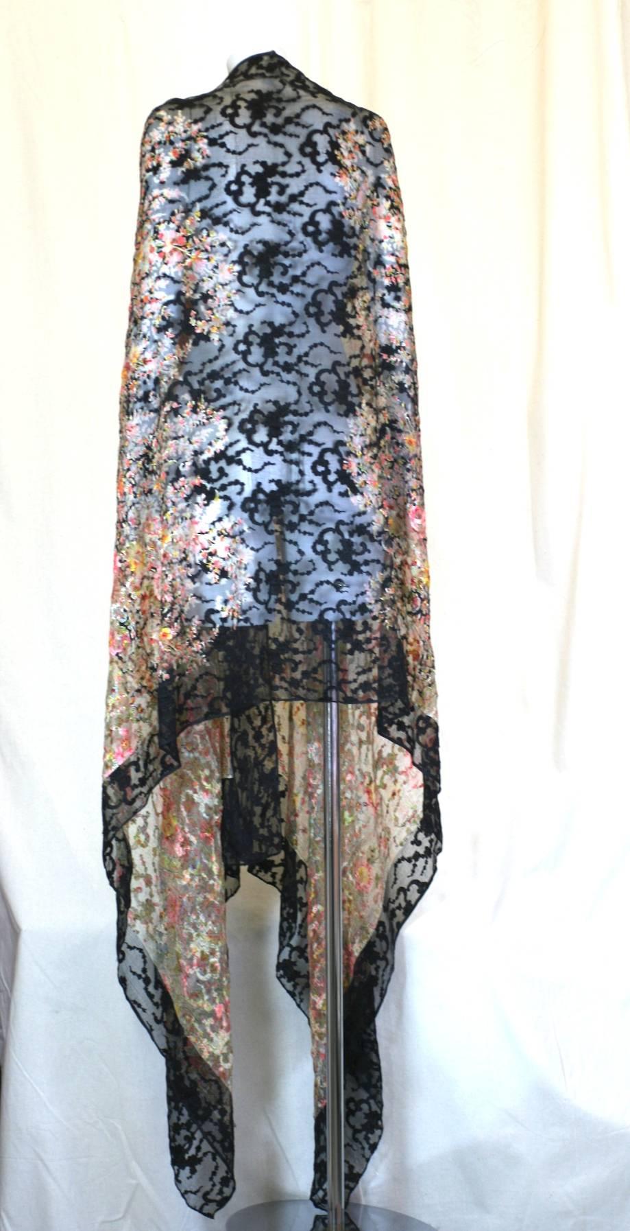Rare, Aesthetic Liberty of London damask chiffon souffle printed shawl from the early 20th century. This varicolored muted shawl features exotic Persian style motifs, printed and brocaded on a ground of sheer ivory and black silk chiffon souffle.