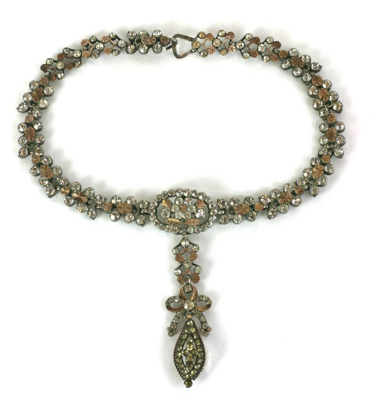 Late 18th Century, Georgian French Paste Necklace. Heavy sterling mounts set with pastes, quartz and gilt metal etched applications. Likely French in origin, with bow drop center pendant. Pendant drop removable to become brooch. Fine, rare and