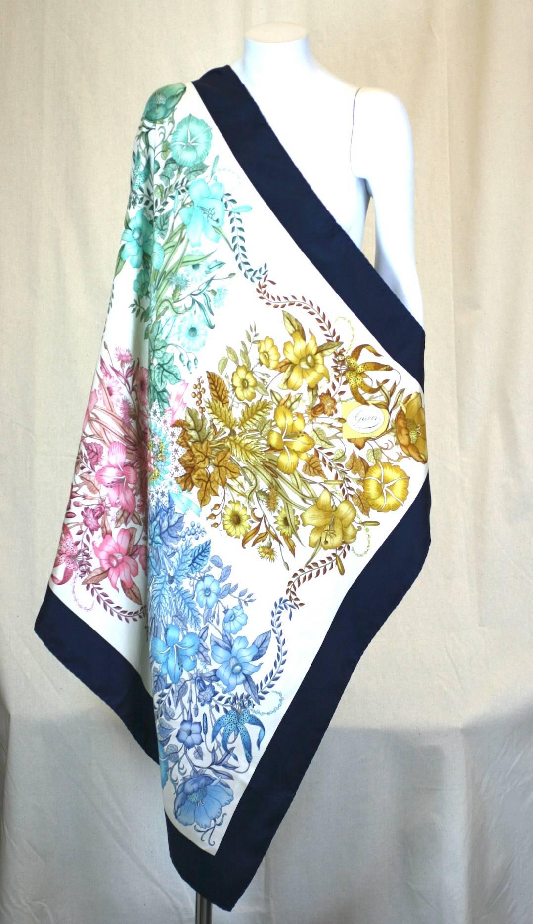 Gucci Floral Bouquet Scarf in silk twill. A series of similar bouquets in different tones are centered within a darker border. Excellent condition. 1990's Italy.
33