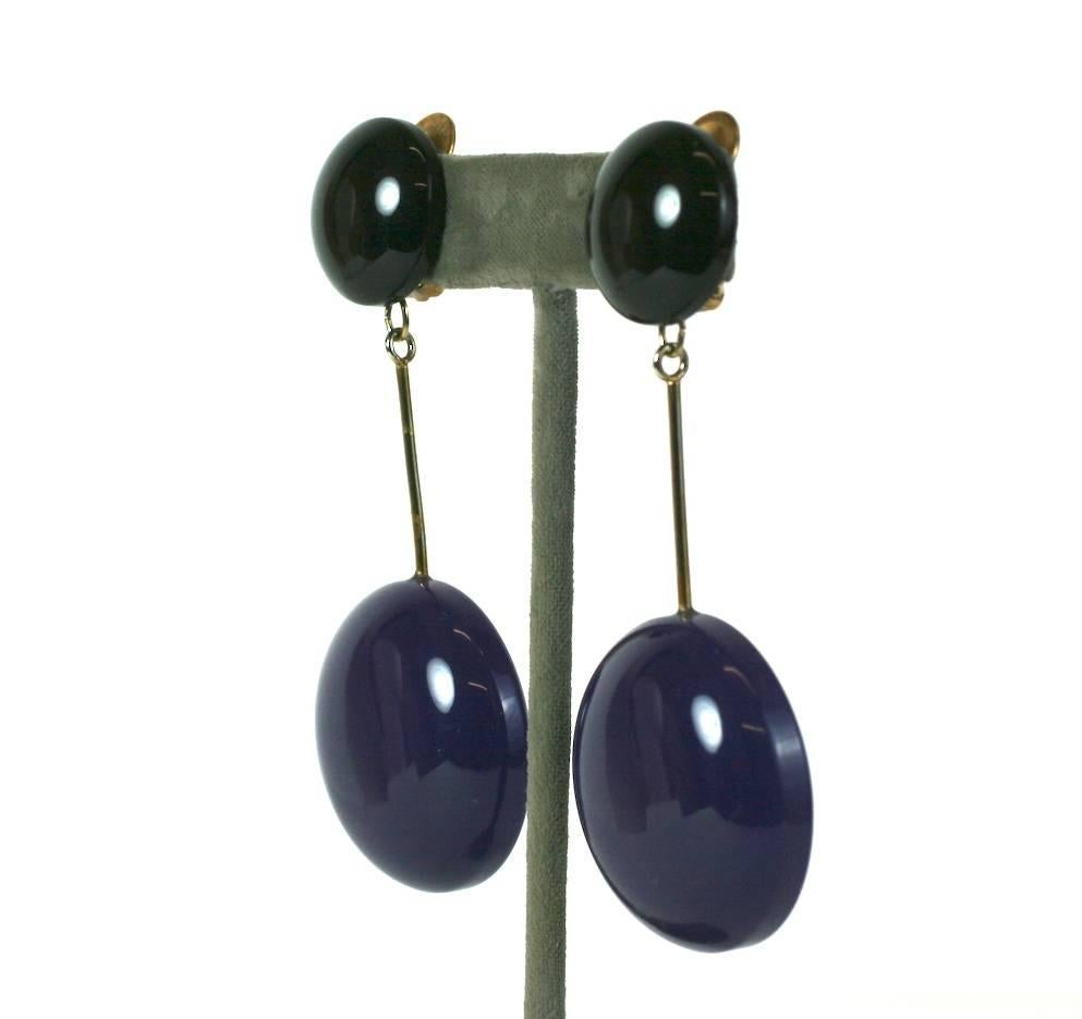 Striking and attractive, long Mod drop earrings in black and deepest eggplant resin. Made in Italy in the 1980's to resemble a 60's Mod style. Clip back fittings. Excellent condition. 1980's Italy. 
3.5