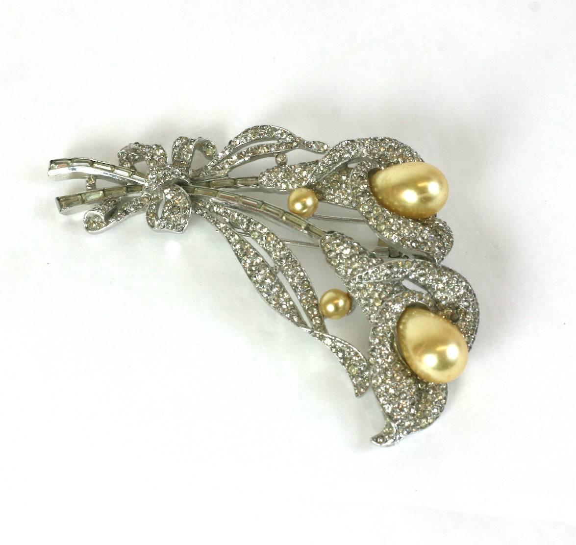Impressive, large and rare Trifari Double Calla Lily Brooch with large faux pear shaped pearls, pearl cabochons, and vari size rectangular baguettes within intricate pave work surrounds. Designed by Alfred Philippe for Trifari. Double clip back