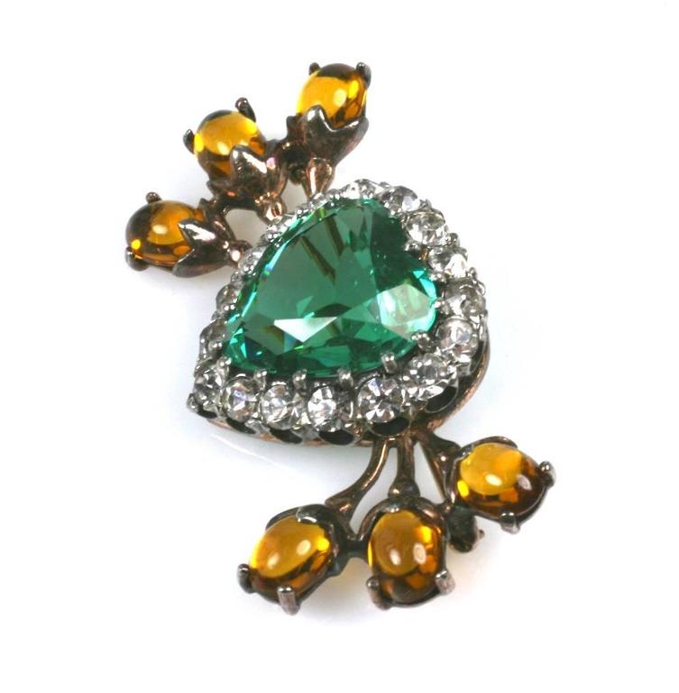 Lovely Retro sterling heart brooch with a gold wash. Large green heart shaped paste is surrounded by crystal pastes and branches with faux citrine cabs. 1940's USA. Excellent condition. Lovely quality. 