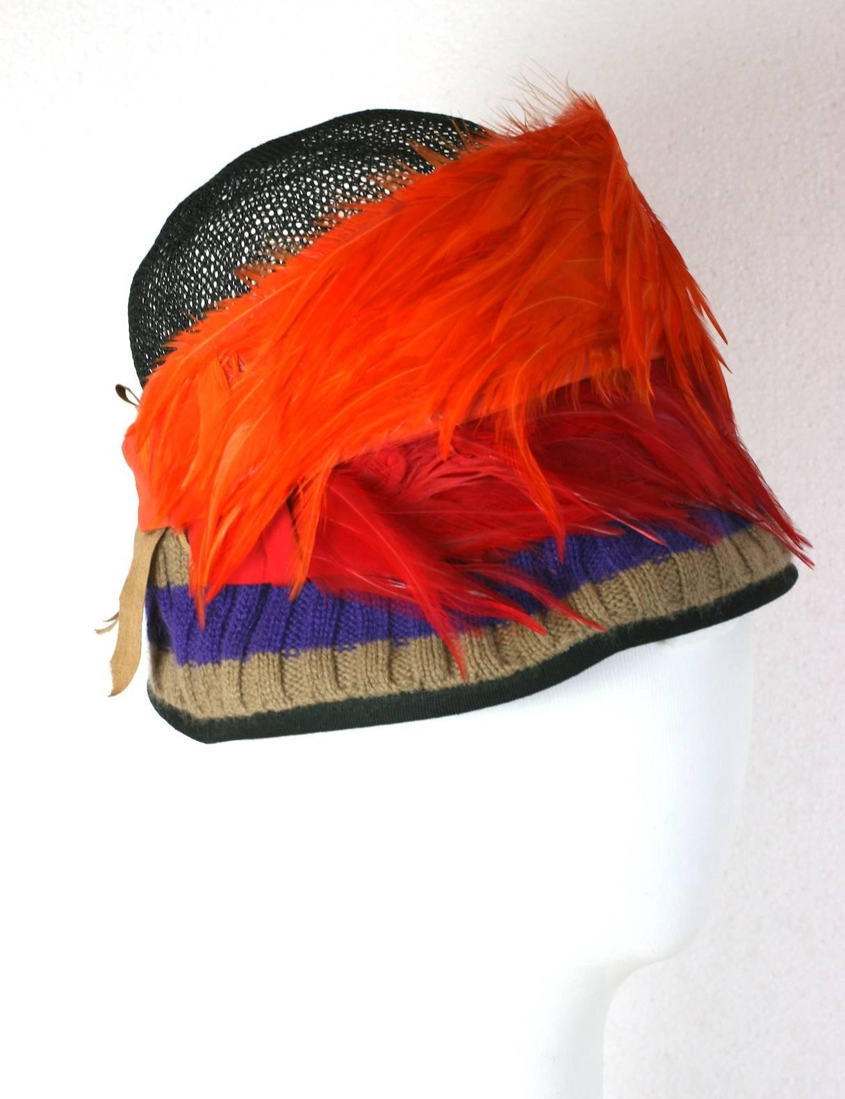 Prada Spring 2005 Collectors Exotic Feather Cloche Hat. look 42.
Bright plumes mixed with wool knit, grosgrain ribbon and synthetic mesh.
4