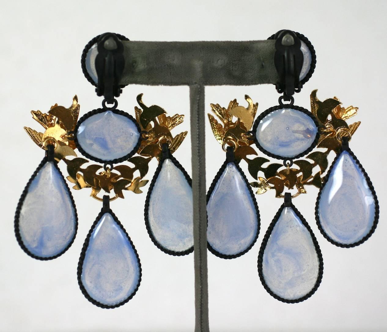 Oversized Girandole Garland Earrings handmade in the Parisian studios of  MWLC. An late 18th century classic form reworked in blackened and gilt metal with opaline blue pate de verre poured glass. A garland of gilt songbirds completes the 