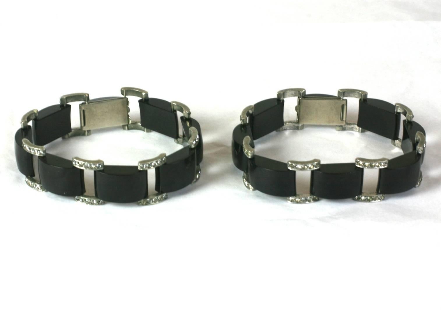 Attractive, matched pair of Art Deco black bakelite and paste link bracelets from the 1930's, set in chrome. Excellent Condition. 1930's USA.
Length 7.50