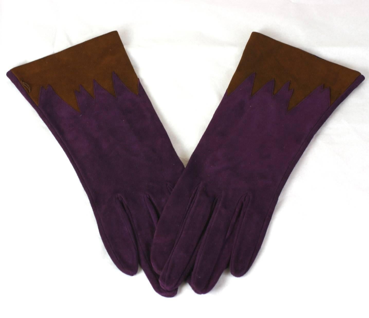 Violet suede gloves with brown suede intarsia inserts at wrists. 
Excellent Condition. Italy 1990's. Size 7.