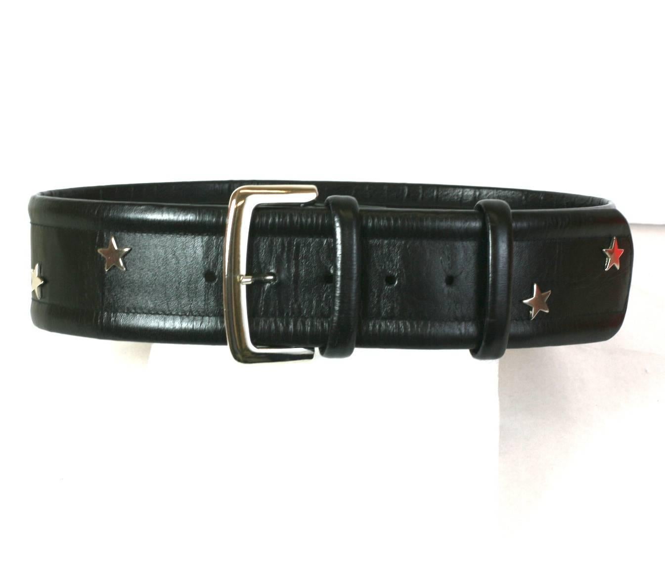 Attractive Mondi wide black leather belt, studded with chromed silver 5 point star motifs.
Excellent Condition. 1990's W. Germany.
Waist sizes 28
