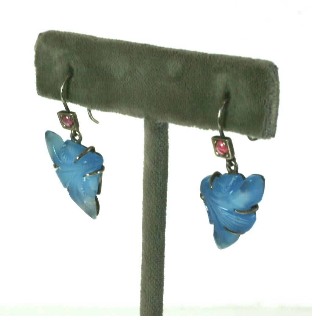Art Deco Chinese floriform carved blue chalcedony and ruby cabochon,dangle earrings set in sterling silver. 1920's. Excellent Condition.
Length  1