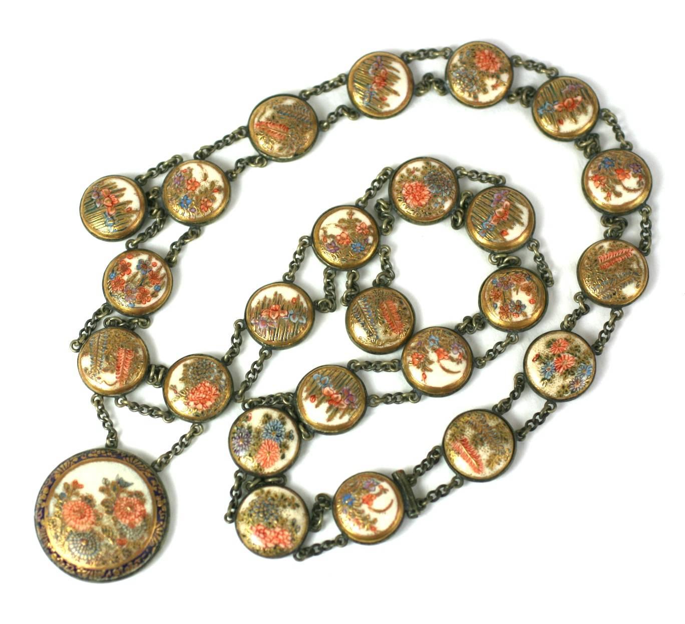 Large and rare 19th Century Satsuma Button Necklace.  Medallions are set in silver metal in a linked chain formation. 1880's Japan. Excellent condition.
24