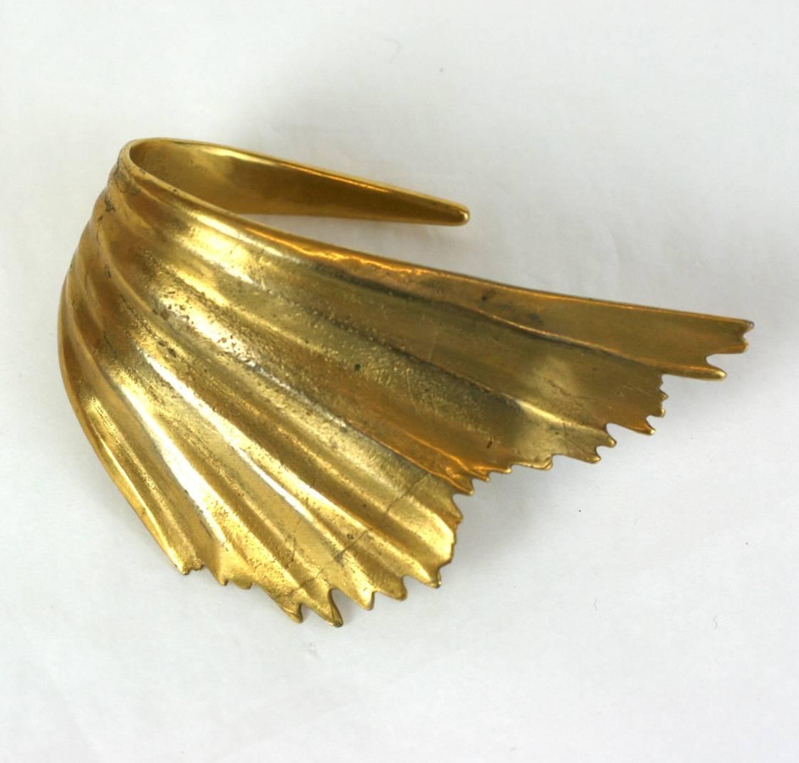 Ted Muehling wrapped and fluted Wing Cuff of formed bronze. Slips on simply from side with no closure. 1980's USA. Excellent condition. Signed 
