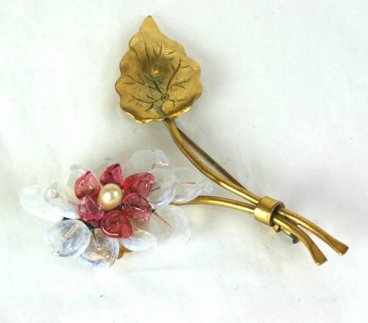 Louis Rousselet pate de verre and faux pearl signature flower brooch of gilt metal stem and opaline and faux ruby leaves. 1930's France. Excellent Condition.
Length 3.25
