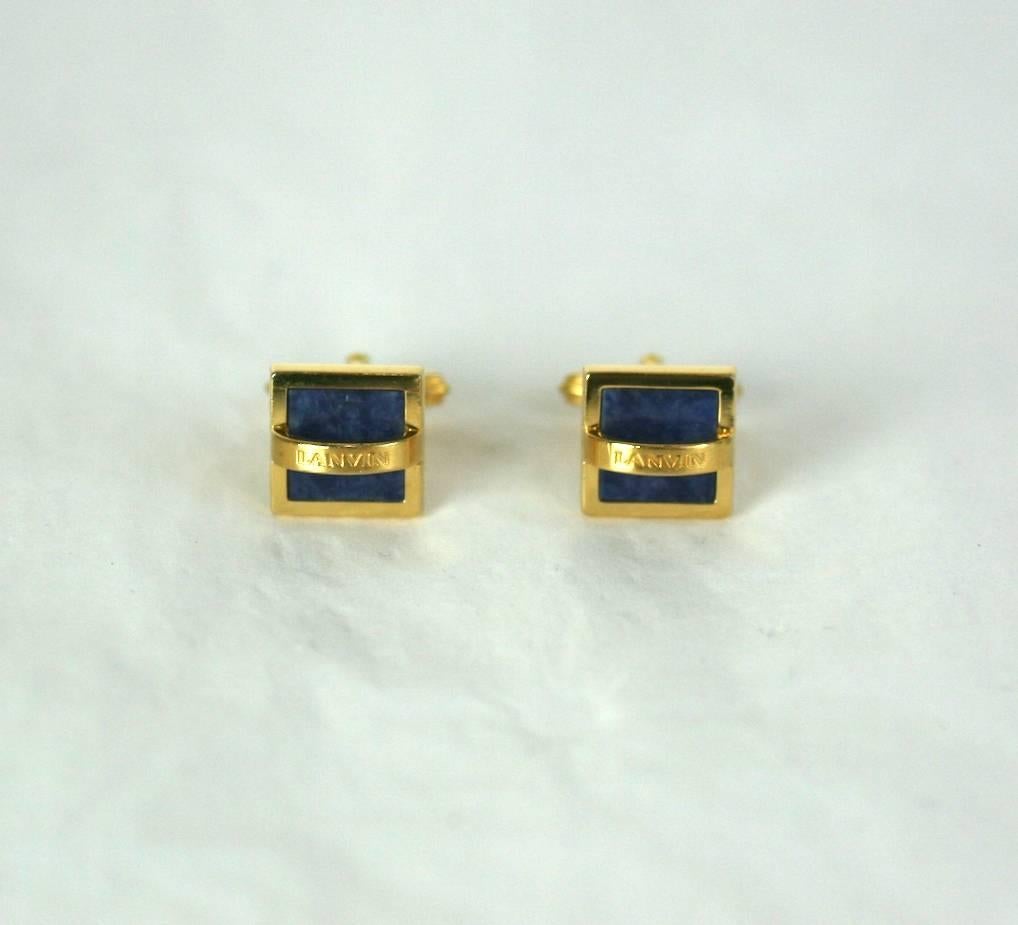 Lanvin, gilt metal and lapis quartz logo cufflinks in the original Lanvin Blue linen box. 1980's France. Toggle backs. Excellent Condition
.50