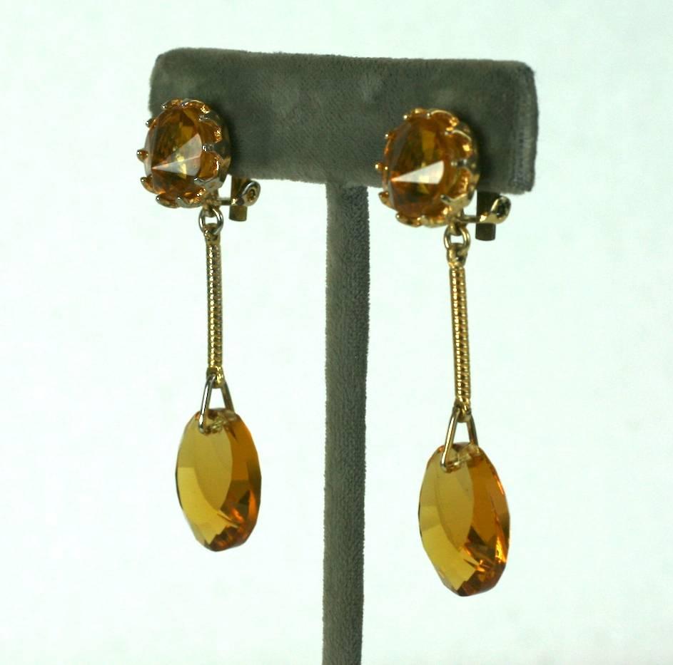 Louis Rousselet faux citrine pate de verre and cut crystal, gilt metal drop earring. Clip back fittings, marked France. Excellent Condition
Length  2.75