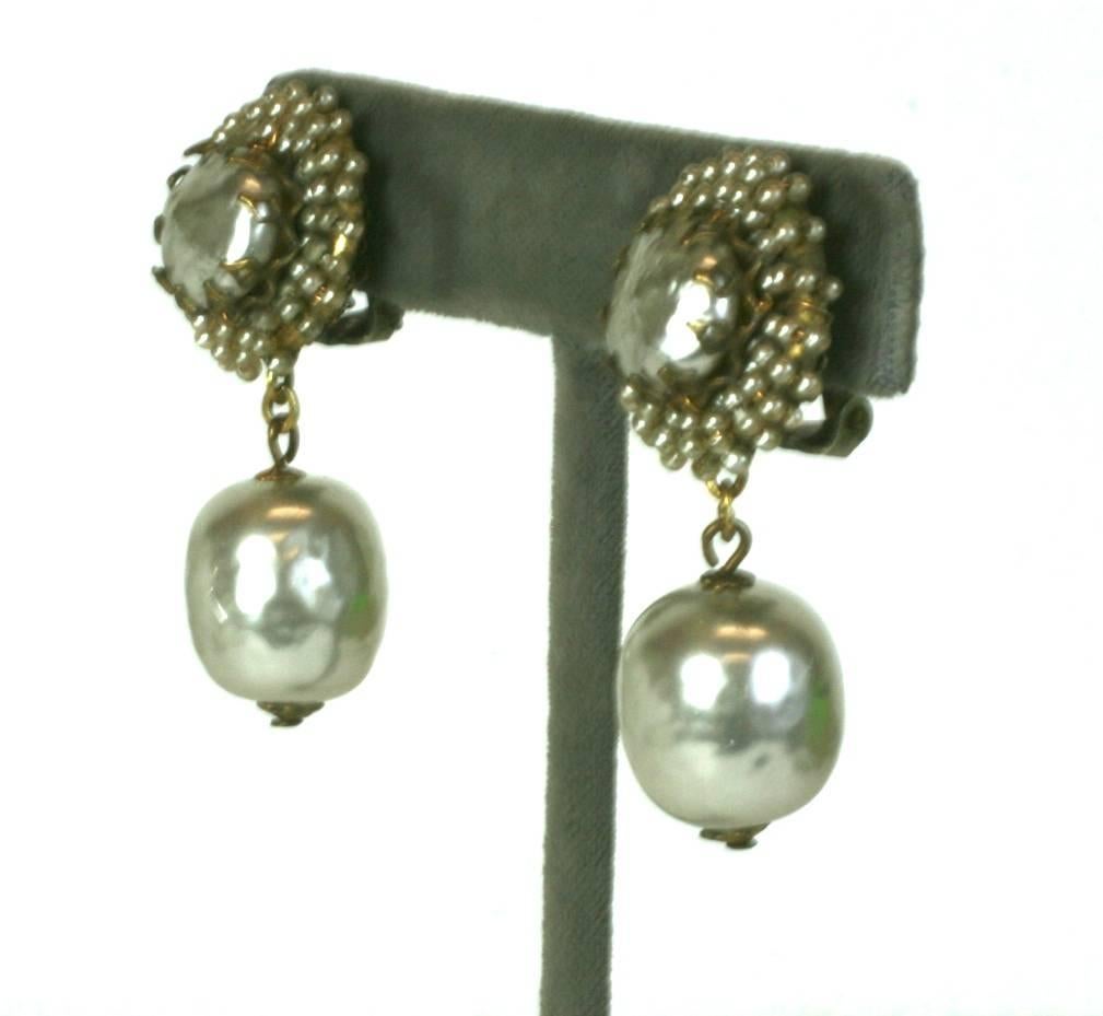Miriam Haskell Signature baroque faux pearl and hand sewn faux seed pearl pendant earrings. Clip back fittings, 1940's USA, Excellent Condition.
Length 1.75