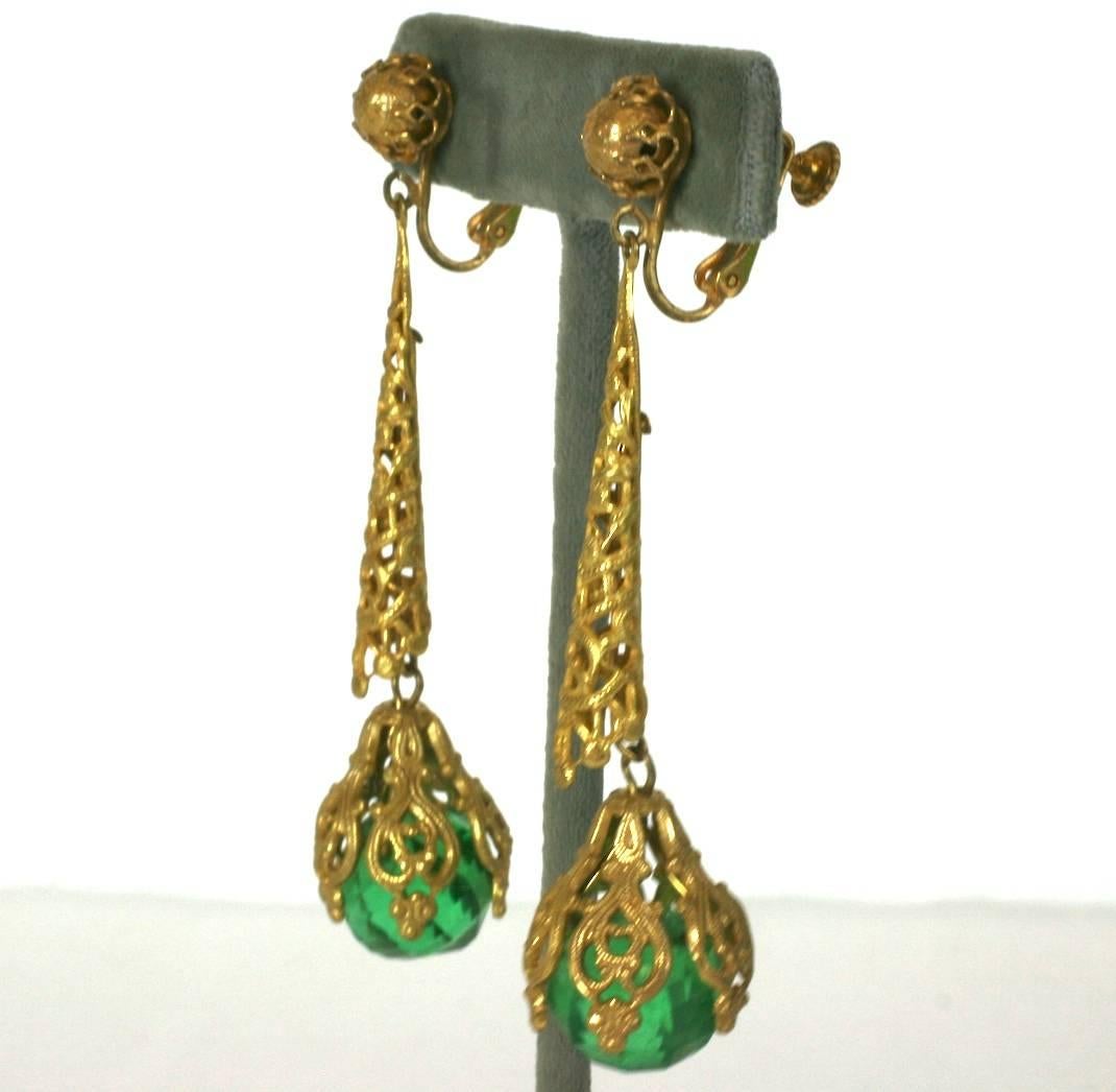 Miriam Haskell signature Russian Gilt filigree, and faceted faux emerald long earrings. Adjustable clip back fittings. 
Excellent Condition
Length 3