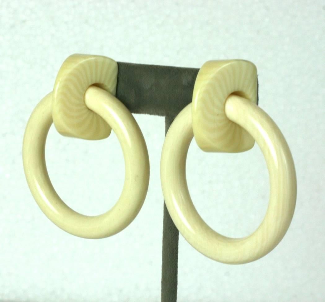 French celluloid door knocker earrings made to look like ivory or ivorene. Large and striking with clip back fittings. 1980's France. Excellent Condition.
Height 2.50