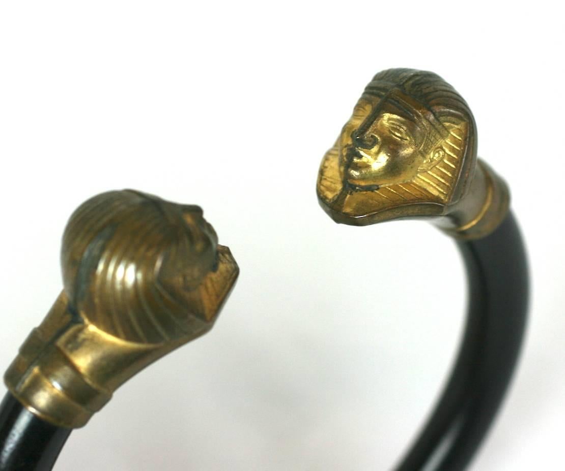 Egyptian Revival Gilt Metal and Bakelite Bangle Bracelet In Good Condition For Sale In New York, NY