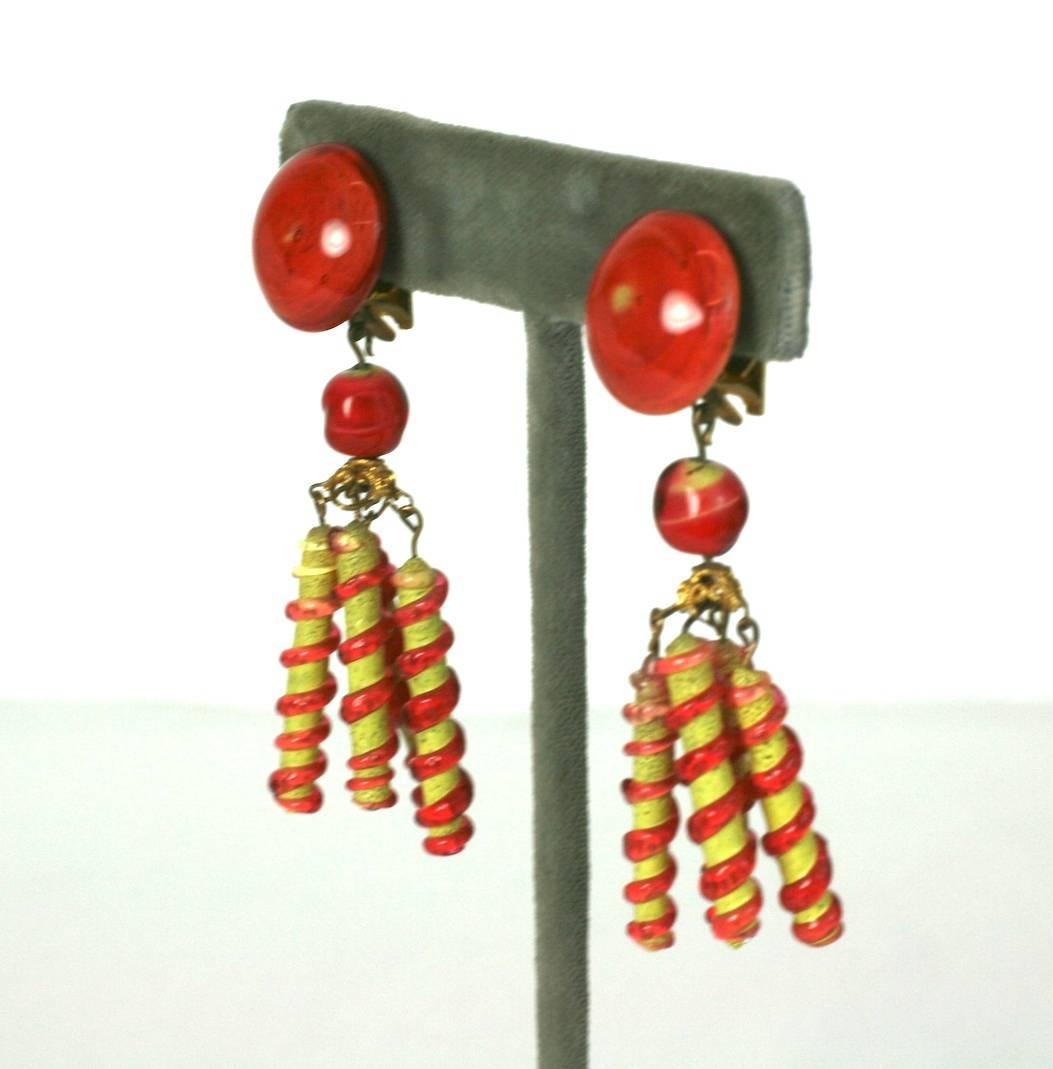 Louis Rousselet lampwork pate de verre earclips of citrus orange and yellow hand made glass cabochons and tubular striped beads, all set in gilt metal.
Clip back fittings. Excellent Condition.
Length 2.50