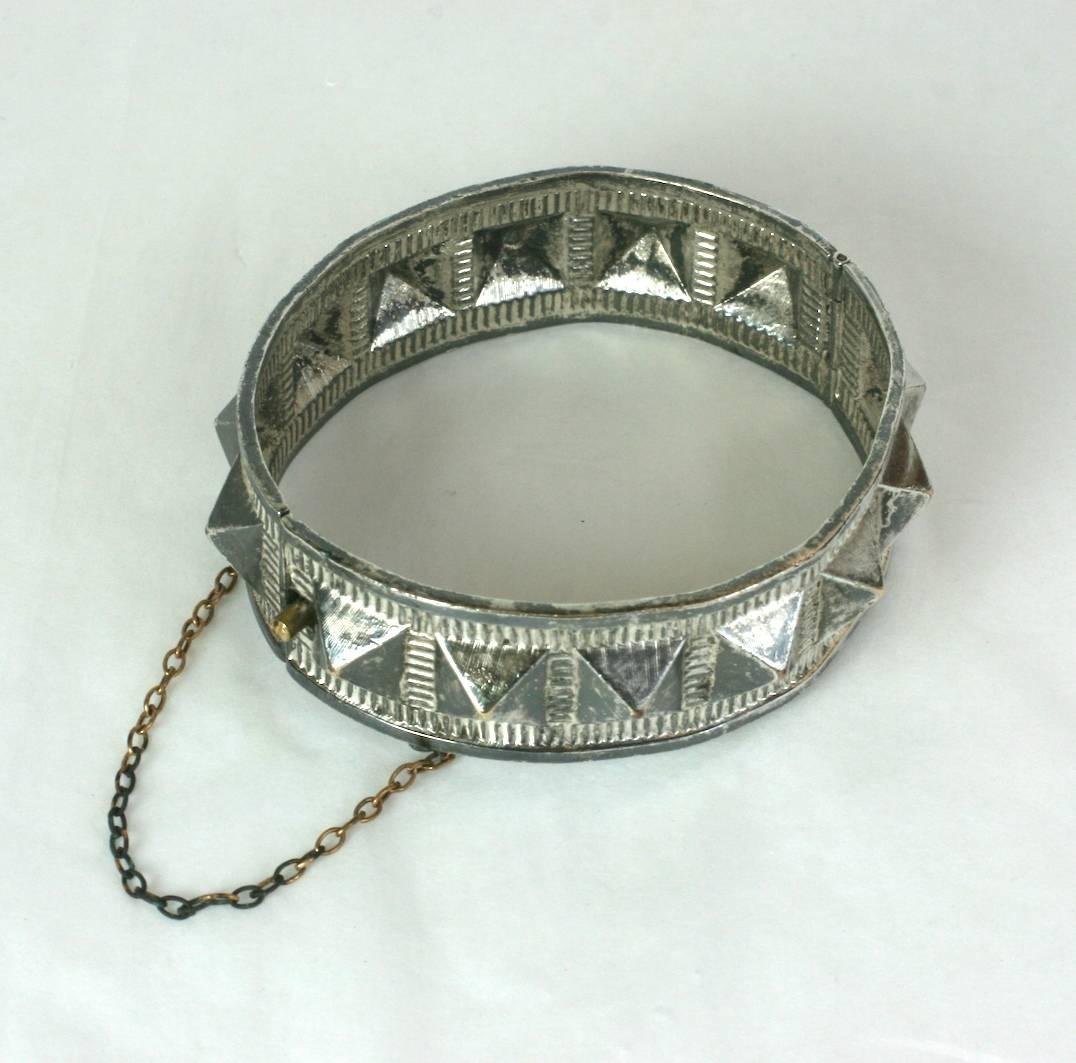 French Victorian silvered metal, hinged bangle bracelet. Fine ribbed border and  raised 