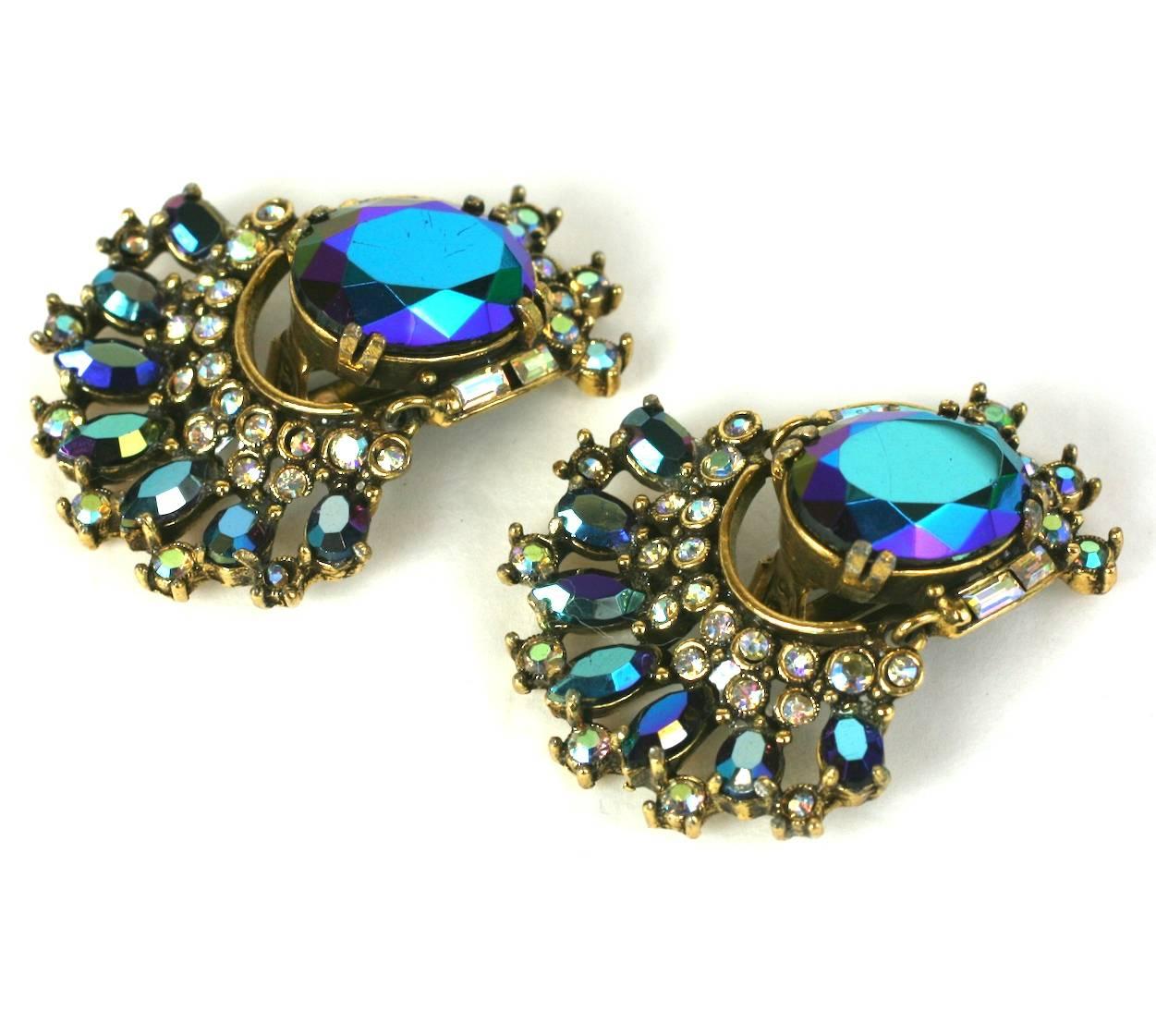 Large and unusual Hollycraft Aurora Borealis articulated earrings with deep purple navettes and large oval stones. The lower arc motif swings off the main stone. Clip back fittings. 1.75