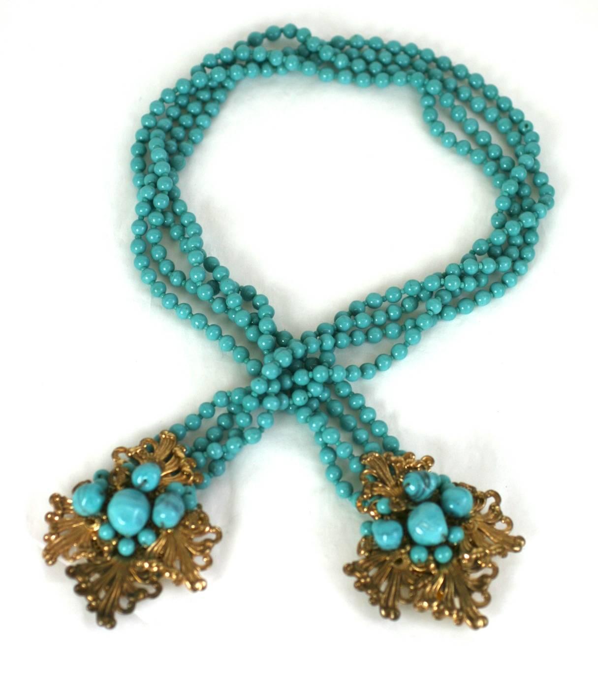 Miriam Haskell early Turquoise Pate de Verre Wrap Lariat from the late 1930's. These lovely lariats have clip fittings on the ends, which were originally designed to be attached to dress necklines in different configurations. Often the lariat was