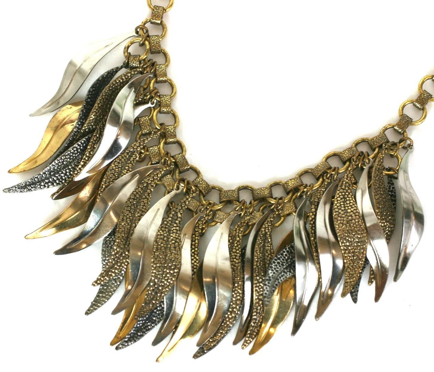 French 1930's multi leaf bib necklace of textured, shiny gilt and silver gilt  curving leaves. Marked France. 
Excellent Condition.
Length 17