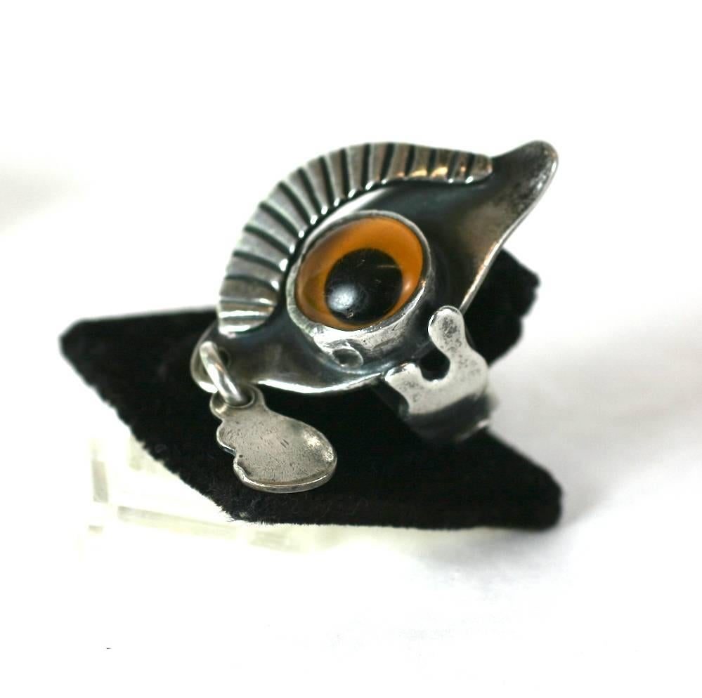 Unusual Artisan sterling ring attributed to NY Modernist Jeweler Sam Kramer. Although unsigned, this piece bears all the handmade hallmarks of his work. 
The surreal 