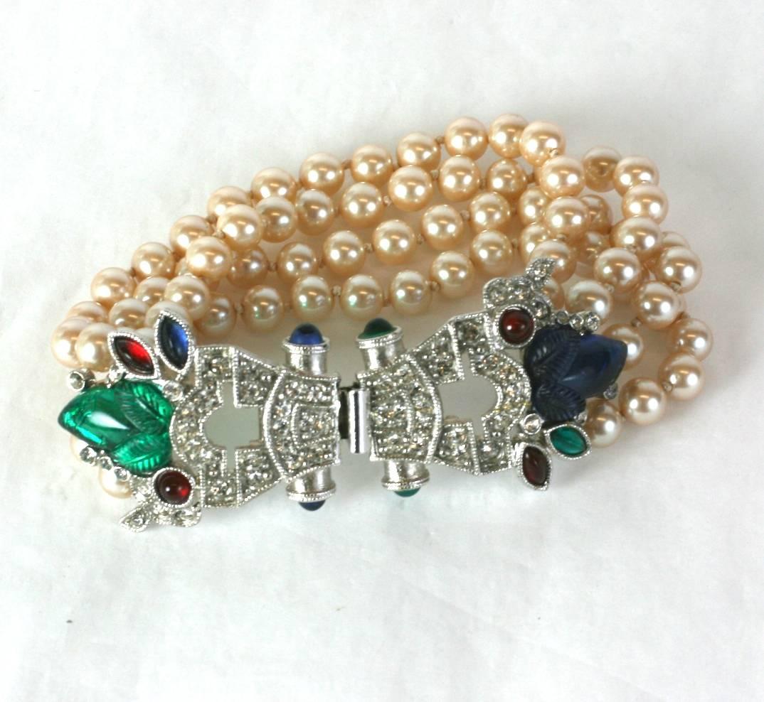 Elegant Givenchy 4 strand faux pearl bracelet  with elaborate Art Deco style Tutti Frutti clasp. 1980's France. 7.5