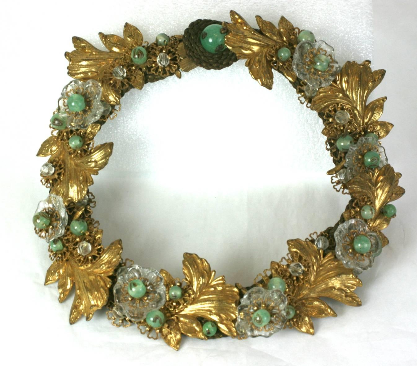 Early Miriam Haskell 1930s Gilt and Venetian Glass Collar, of signature Russian Gilt baroque leaves and flowerheads, hand made crystal flowers, and green patterned Venetian beads. Hand sewn to a base of flattened gilt passementerie ribbon. Early