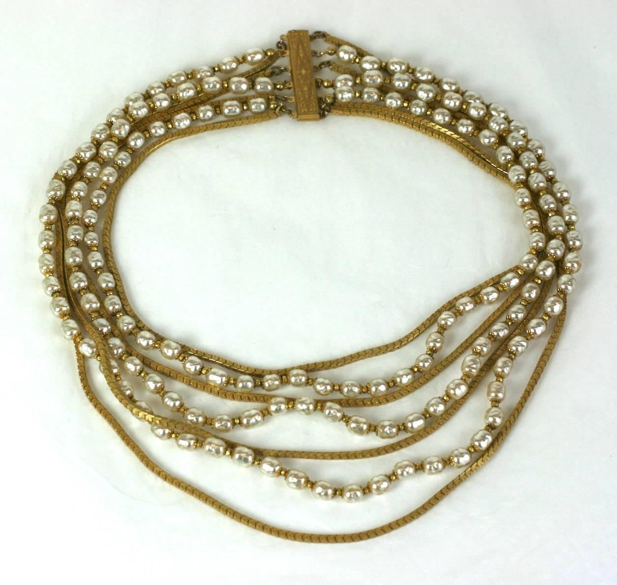 Elegant Miriam Haskell classic baroque faux pearl and signature Russian Gilt link chain seven strand necklace. 
1960's USA. Excellent Condition
Length interior 15.5