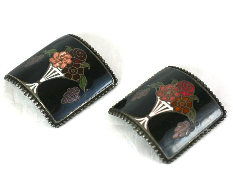 French Art Deco Shoe Buckles with enameled faces of stylized flower vases on silvered metal. Colorations are purposely slightly different. High style, Erte inspired design. Original black velvet backings. Excellent condition. 1.5