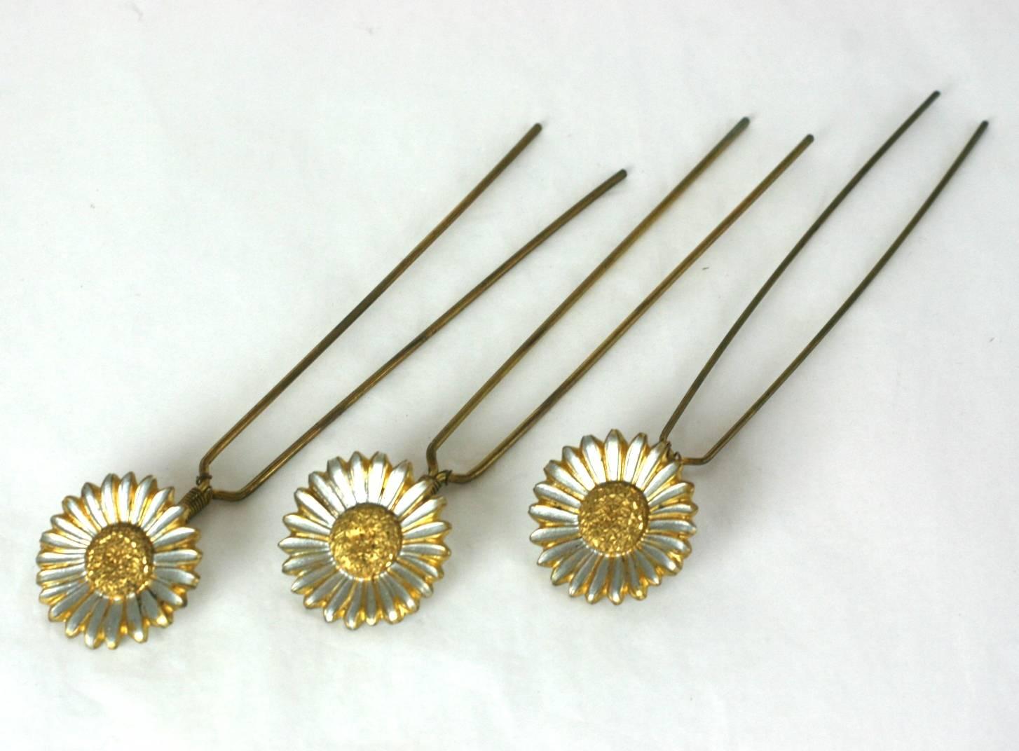 Charming set of Victorian Tremblant Sunflower Hair Picks in silvered and gilt metal. Flowers are set on springs and sway gently with wearer. 
Sunflowers were a popular motif in the Aesthetic movement in the Decorative Arts of the 19th Century.
